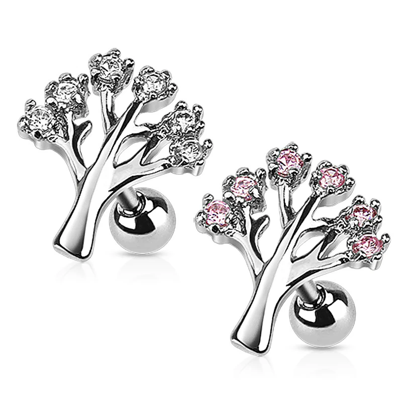 Traguspiercing mit einem Baum aus Steinen