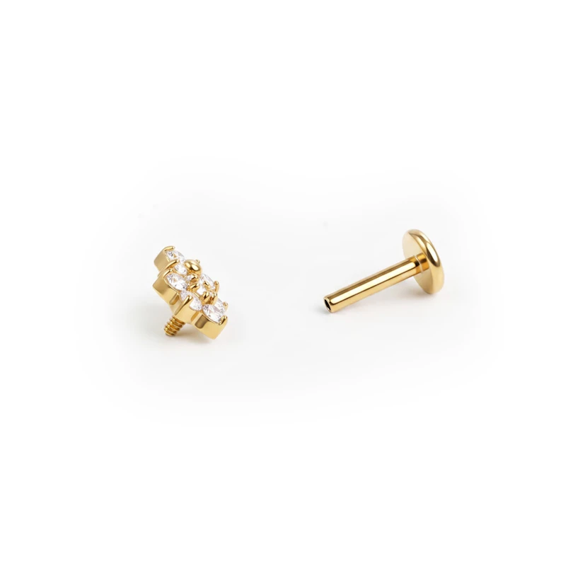 Titan-Blumenlabret mit zwei Schmucksteinen