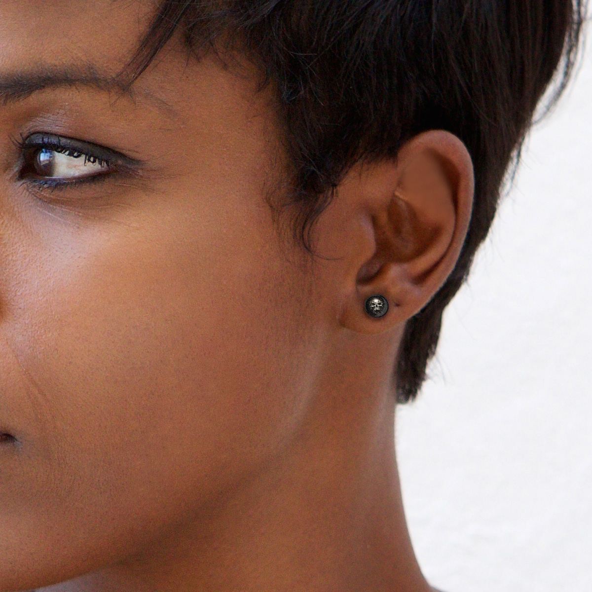 Plug aus Acryl mit einem Totenkopf